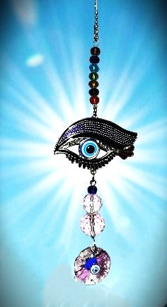 Evil eye protective sun catcher with rainbow chakra beads, crystal spheres and disc.