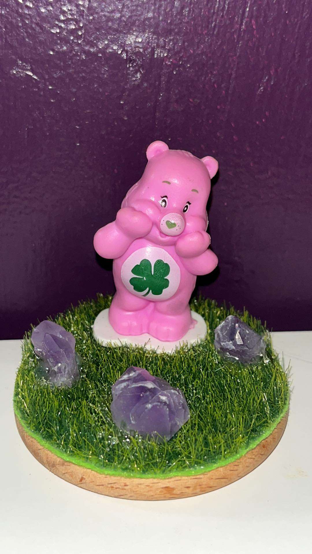 Kids Amethyst specimen freeform with Pink care bear from the Care Bears  show and a Dwarves from the Snow White movie. Super cute!