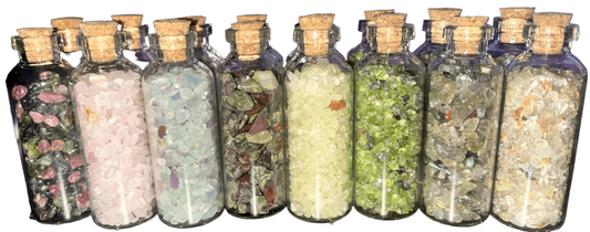 AAA grade Crystal chips gravel mini glass bottles with cork top. Perfect for spell bottles, altars, jewelry, or crystal decor. 2.25 inches