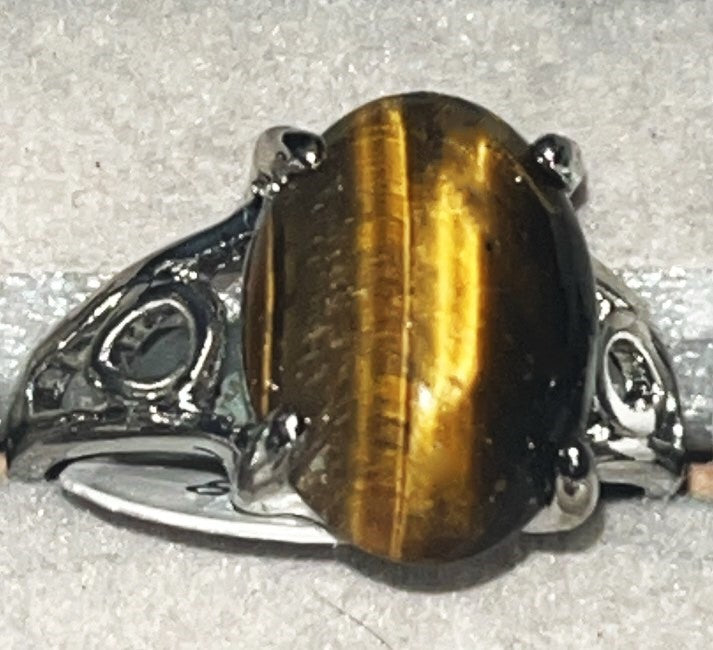 Tiger's Eye crystal rings. Natural gemstone .Not adjustable. Great gift Idea. Brings energy, wealth, confidence