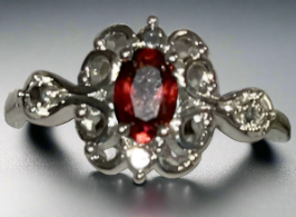 Exquisite Ruby statement ring. Natural gemstone. Adjustable silver band. Symbolizing passion, love, and vitality.