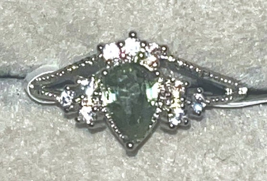 Peridot crystal bling ring.  Brings positive energy, growth, and prosperity. Adjustable to fit all sizes.