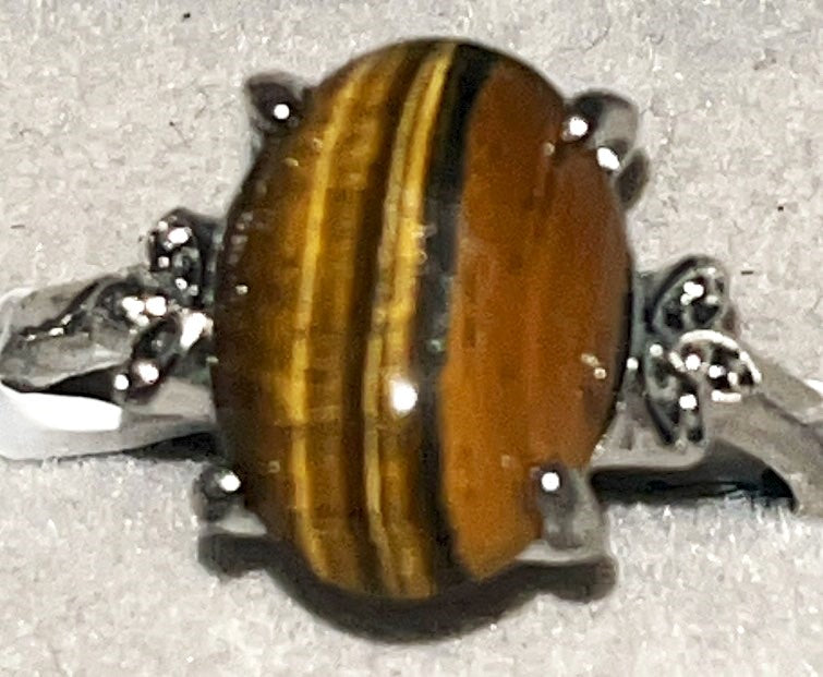 Tiger's Eye crystal rings. Natural gemstone .Not adjustable. Great gift Idea. Brings energy, wealth, confidence