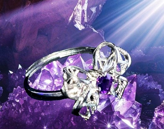 Amethyst bow crystal ring with silver lace style design. Natural gemstone. Adjustable to fit all sizes. Perfect for Valentine's Day!
