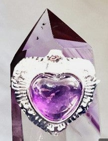 Amethyst heart crystal adjustable ring . Natural gemstone. Adjustable to fit all sizes.