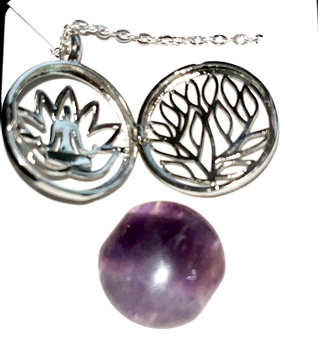 Interchangeable Amethyst Meditating yoga pose pendant. Comes with silver chain. Pendant opens and stone can be changed.