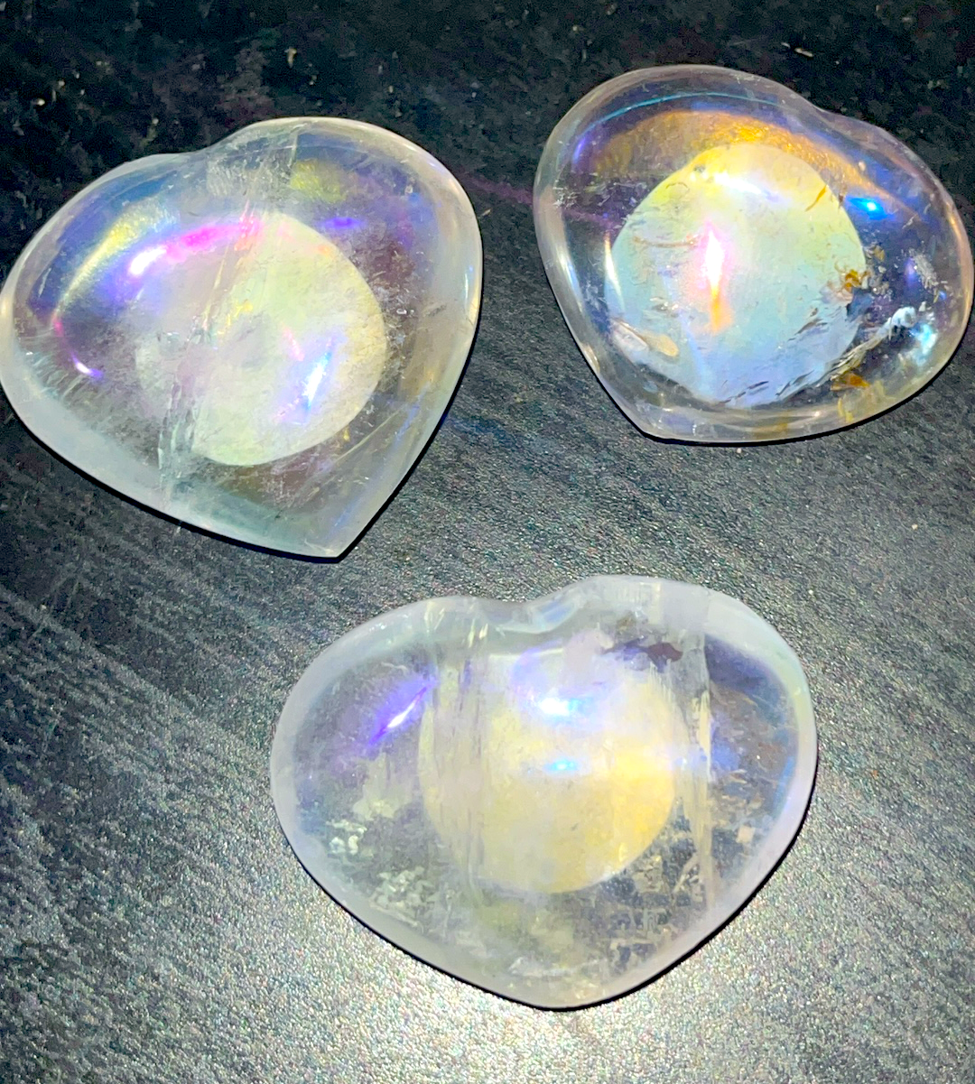 Aura clear quartz crystal hearts. Rainbow aura, strong energy, strong healing.