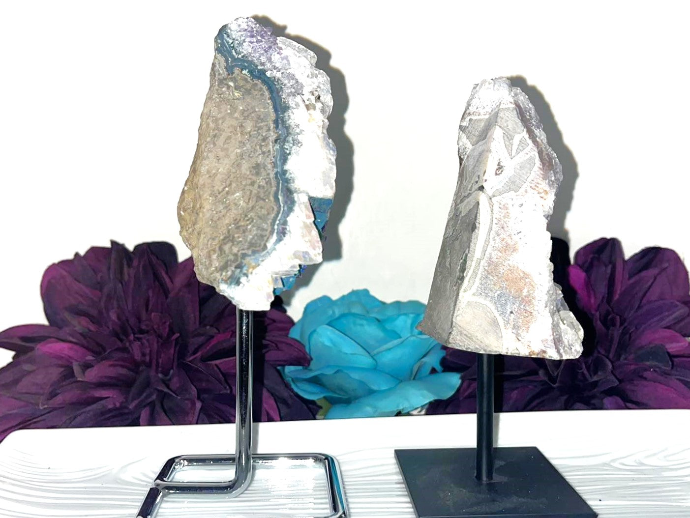 Stunning Rainbow Aura Amethyst druzy specimens on secured stands. Absolute collector's items!