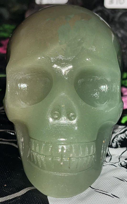 Green Aventurine high quality Crystal skull carving. Looks like candy apple colors!