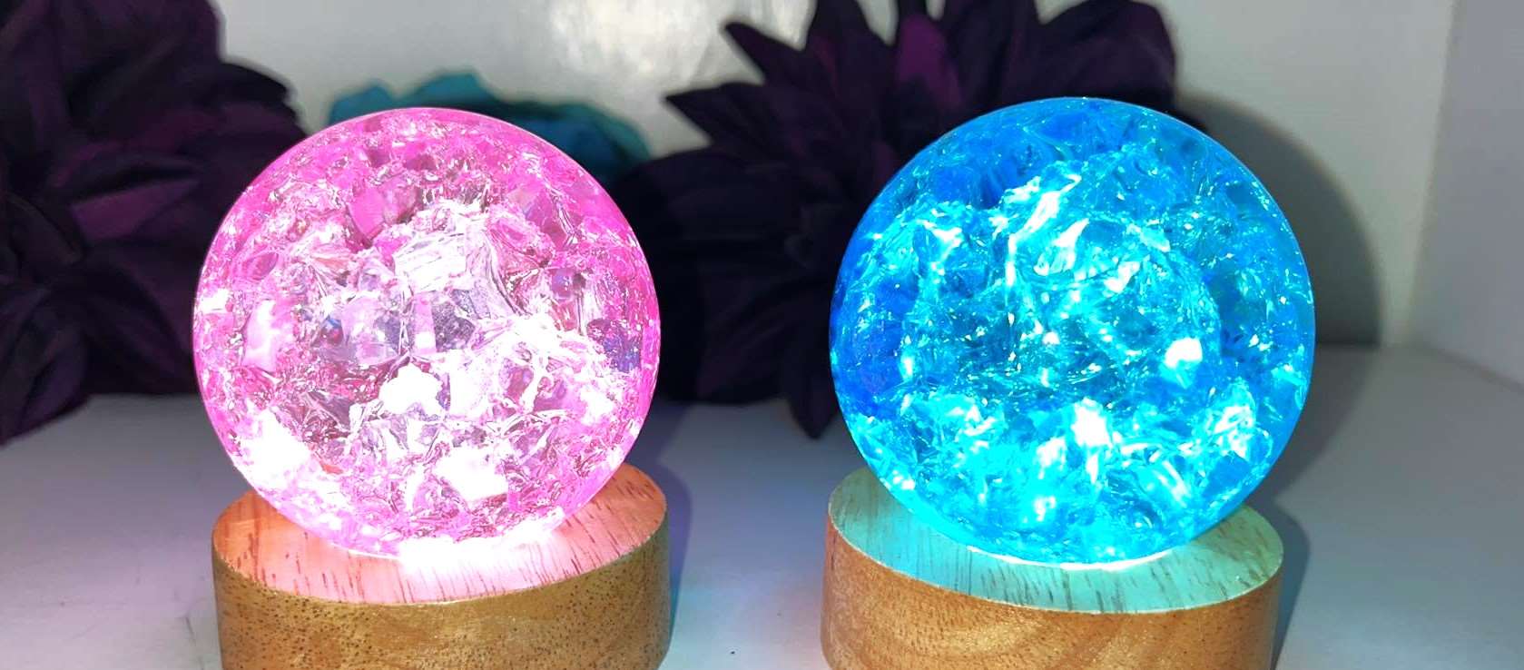 Crackle Quartz crystal spheres, Pink & Blue. Represents white spiritual light and is associated with the Soul Star Chakra, activates energy