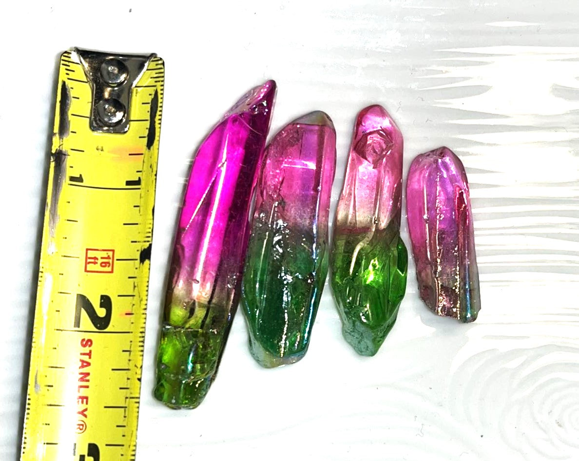 Natural Rainbow Aura clear quart DT points. Choose Titanium Aura, Pink/ Blue, Yellow, Pink, Purple, or Green/ Pink. Jewelry making