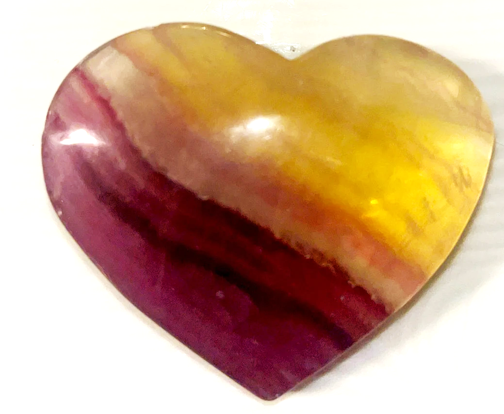 Large Yellow and purple Fluorite striped crystal heart carving. Beautiful colors! Brings focus, and peace