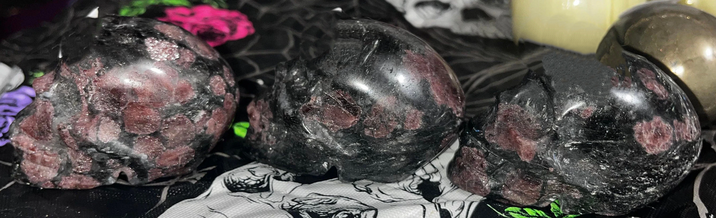 Natural Garnet Crystal carved skulls mixed in Firework stone. Ignite your passion, creativity, and zest for life