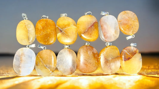 Natural Golden Healer oval shaped crystal pendant. A  master healer that possesses the amplifying properties of Clear Quartz