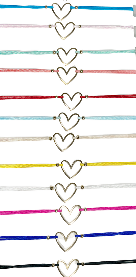 Adjustable heart bracelets with gold heart and gold bead accents. 12 Colors. Adjustable slip knot closure for all sizes.