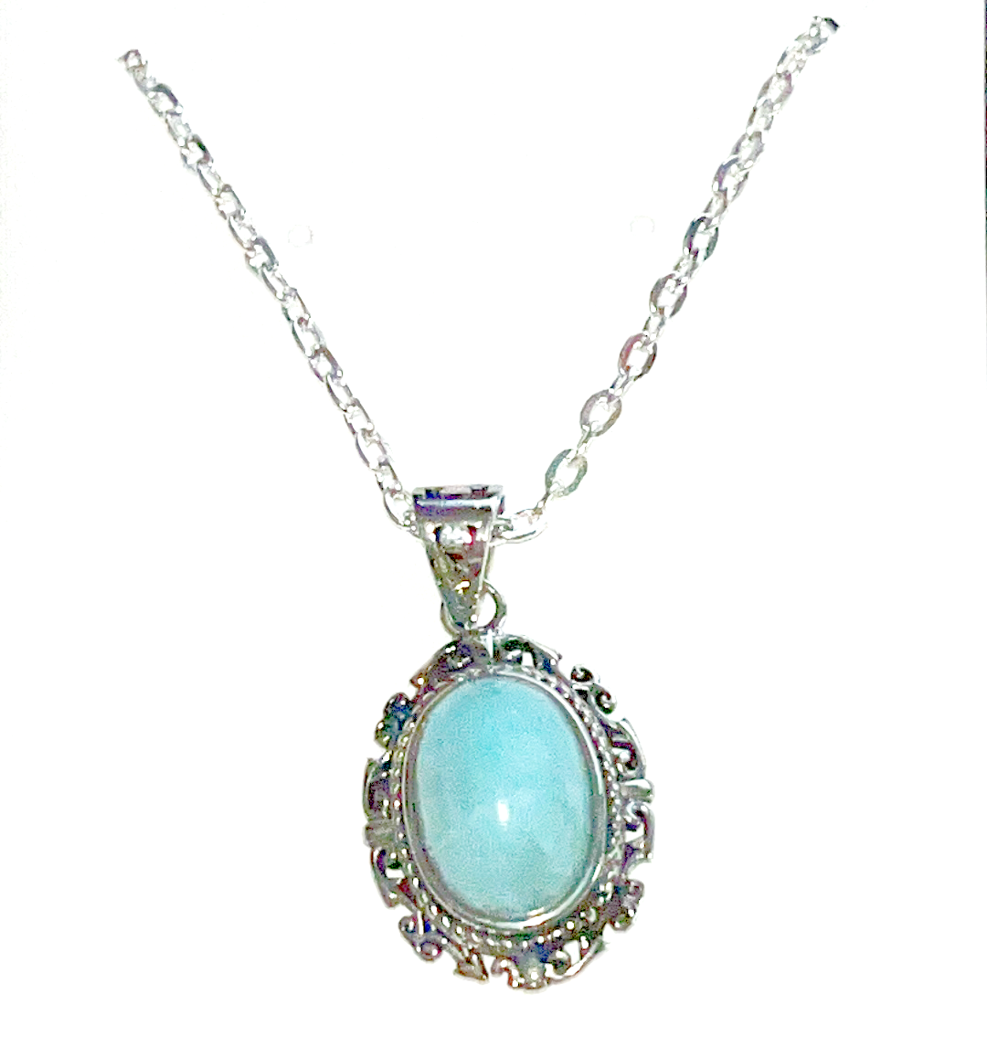 Real Larimar crystal pendant, comes with silver chain. Larimar is a very strong crystal for spiritual abilities