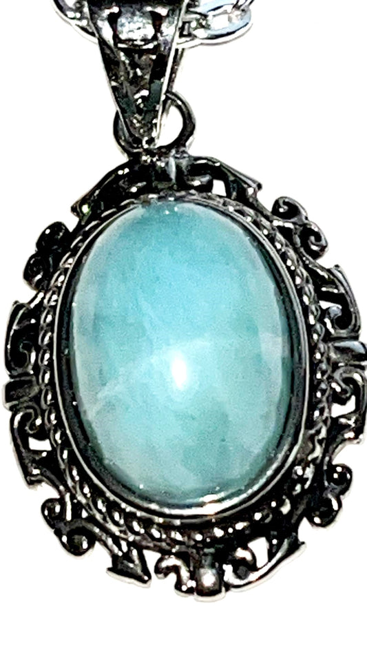 Real Larimar crystal pendant, comes with silver chain. Larimar is a very strong crystal for spiritual abilities