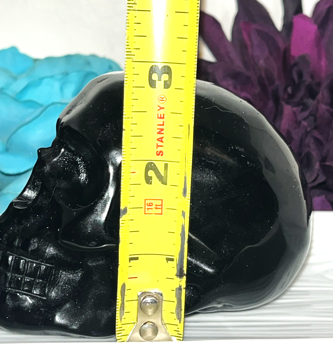 Large Black Obsidian crystal skull. Protection, strength, clarity, and grounding energy.