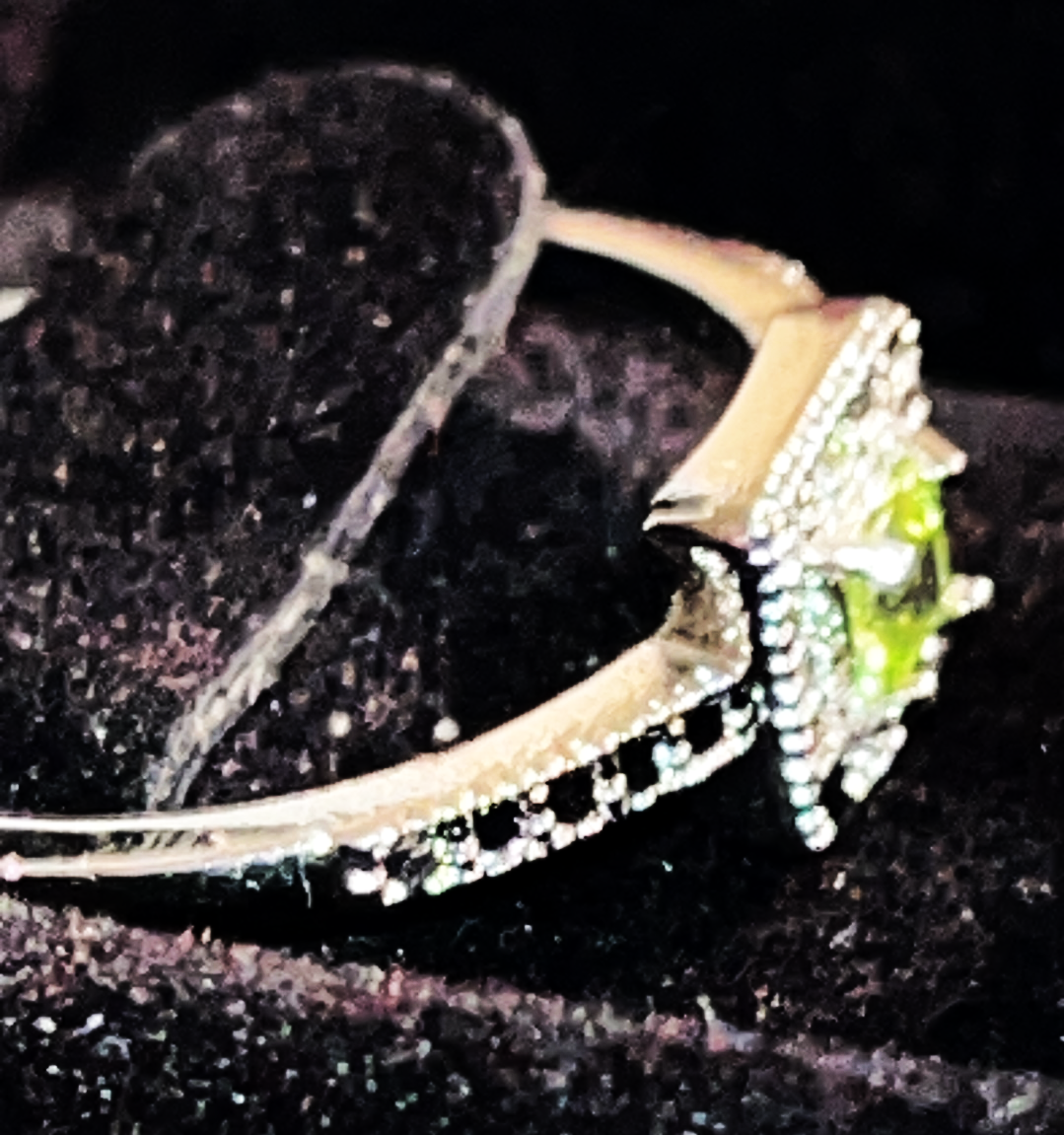 Peridot crystal ring. Natural gemstone. Brings positive energy, growth, and prosperity. Adjustable to fit all sizes.