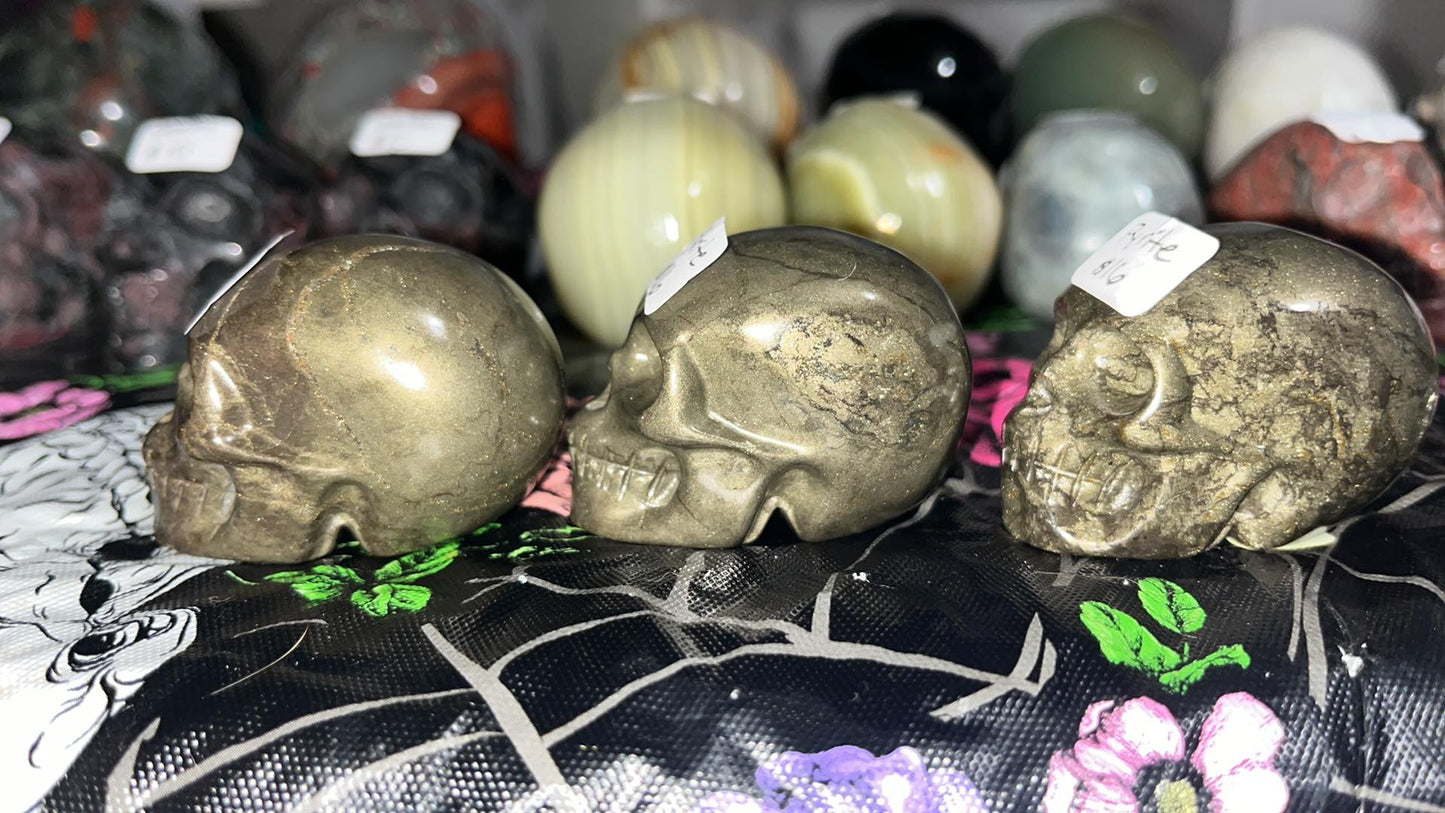 Natural Pyrite crystal skull carving. This material is a powerful embodiment of abundance, protection, and prosperity. Brings money & sucess