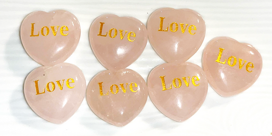 Rose Quartz LOVE Crystal hearts adorned with the word "love" inscribed in elegant gold letters.  1x1 in