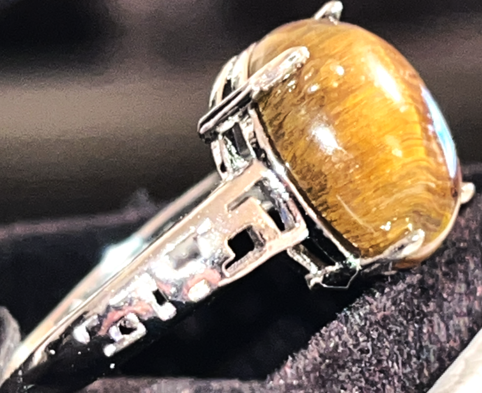 Tiger's Eye crystal adjustable ring. Natural gemstone. Adjustable to fit all sizes. Great gift Idea. Brings energy, wealth, confidence