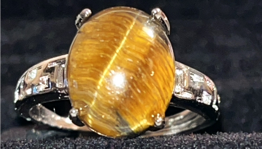 Tiger's Eye crystal adjustable ring. Natural gemstone. Adjustable to fit all sizes. Great gift Idea. Brings energy, wealth, confidence