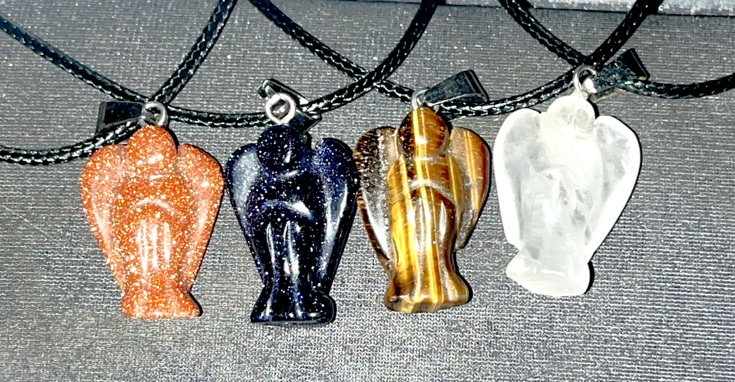 Mini crystal angel pendants necklace with included rope necklace. A timeless symbol of protection, guidance, and celestial blessings.