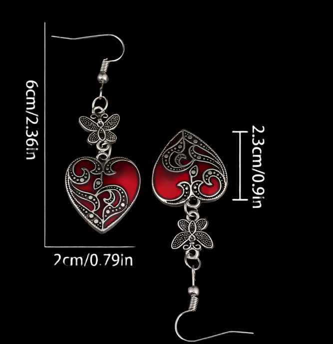 Gothic punk style antique heart-shaped earrings dangling from butterflies!  Unique, classy, and perfect.