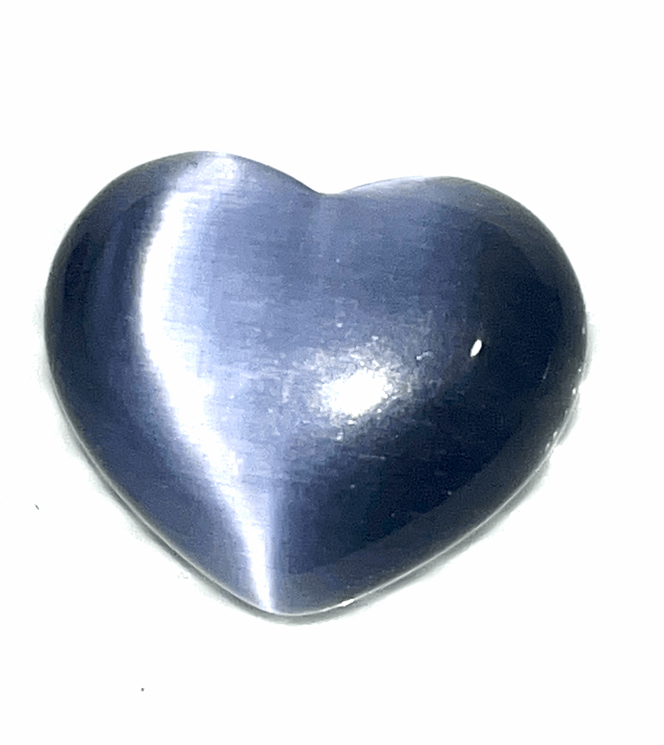 Cats eye gorgeous Crystal hearts- 1.5 inch x 1 inches. Help ward off evil and acts as a talisman to protect against unforeseen danger.