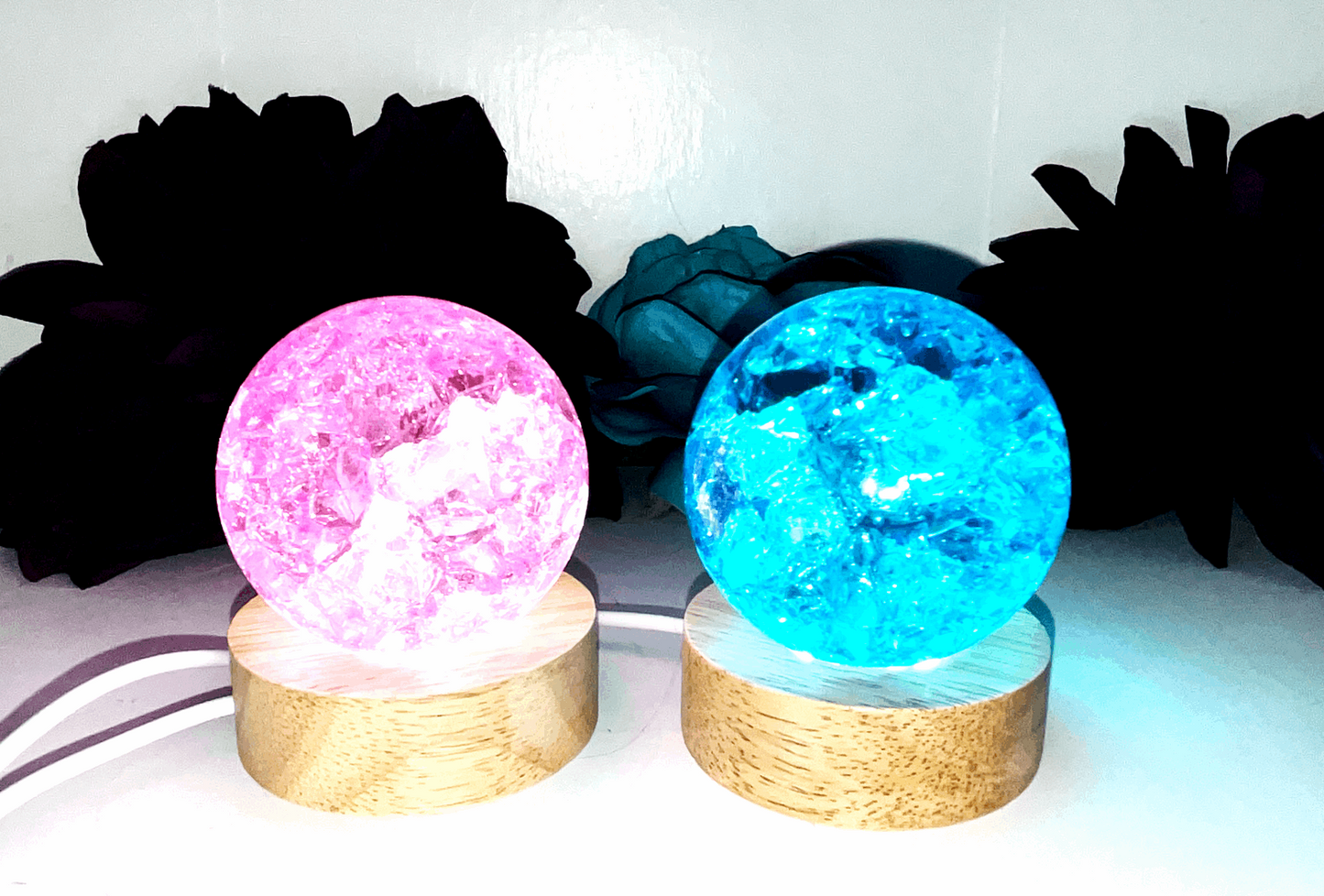 Crackle Quartz crystal spheres, Pink & Blue. Represents white spiritual light and is associated with the Soul Star Chakra, activates energy