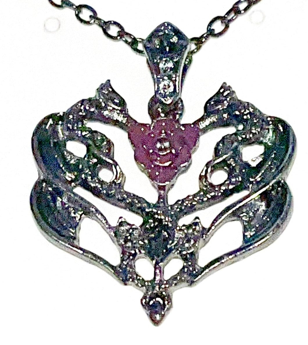 Double twin dragon necklace pendant with or without rhinestones. Comes w/rope chain necklace.