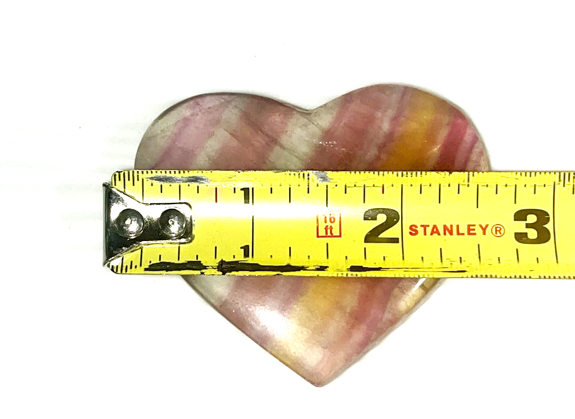 Large yellow, orange & purple Fluorite striped crystal heart carving. Beautiful colors! Brings focus, and peace