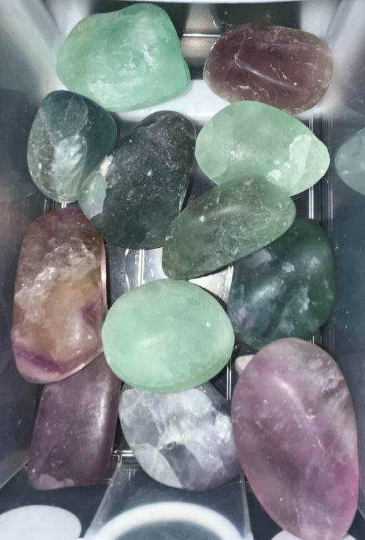 Fluorite Crystal tumbles, rainbow variety of colors, medium and large sizes. Great quality. Absorbs negative energy, improve concentration