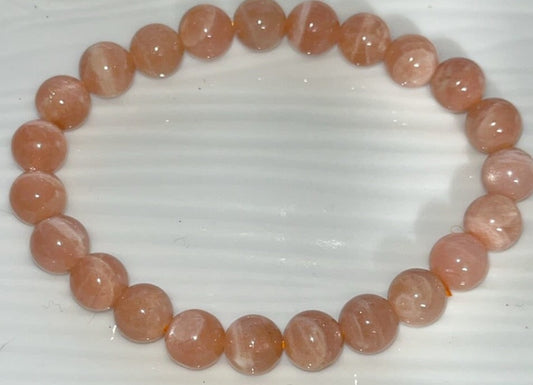 Peach Moonstone 8 mm bracelet for deep emotional healing , reflects the mysteries of the moon,