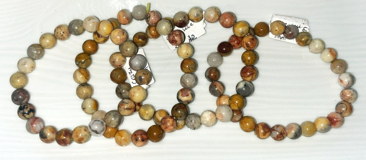 Crazy Lace Agate 8 mm bracelet- Absorbs emotional pain, balancing & protection, believed to ward off the "evil eye," bringing joy, focus