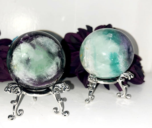 Rainbow Fluorite Bigger Medium spheres. Brings focus, clears mind, enhance intuition, and promote mental clarity.