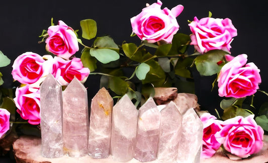 Natural Rose Quartz crystal points with Golden Healer. Attract and strengthen love of all kinds—romantic, self-love, familial, & friendship