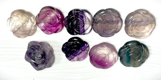 Rainbow Fluorite crystal rose carvings. Size 1 inch x 1inch. Many different Rainbow Fluorite color combinations. Beautiful and gentle energy