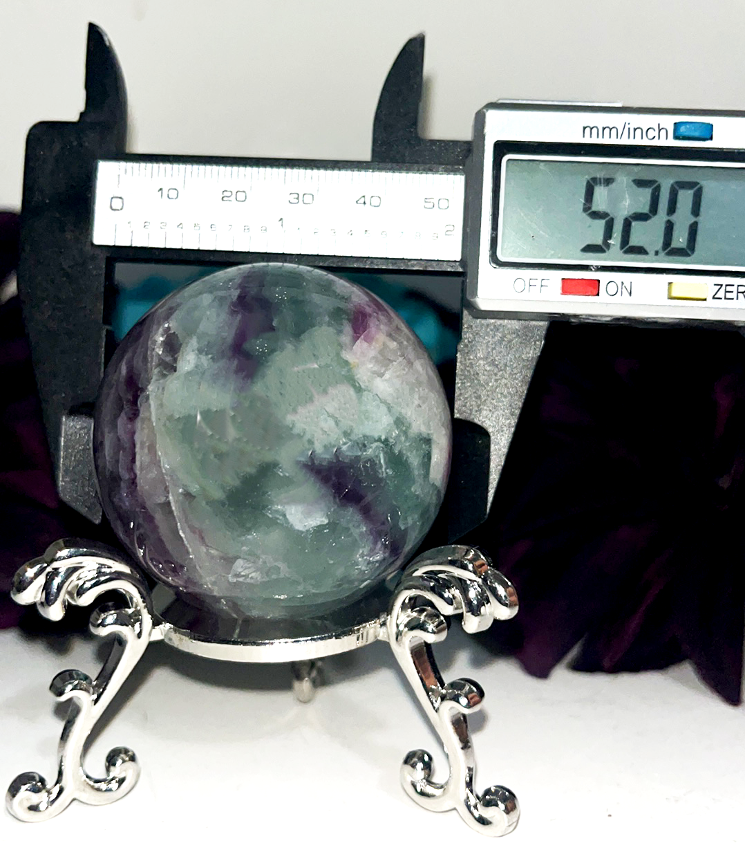 Rainbow Fluorite small-med spheres. Brings focus, clears mind, enhance intuition, and promote mental clarity. Priced to sell