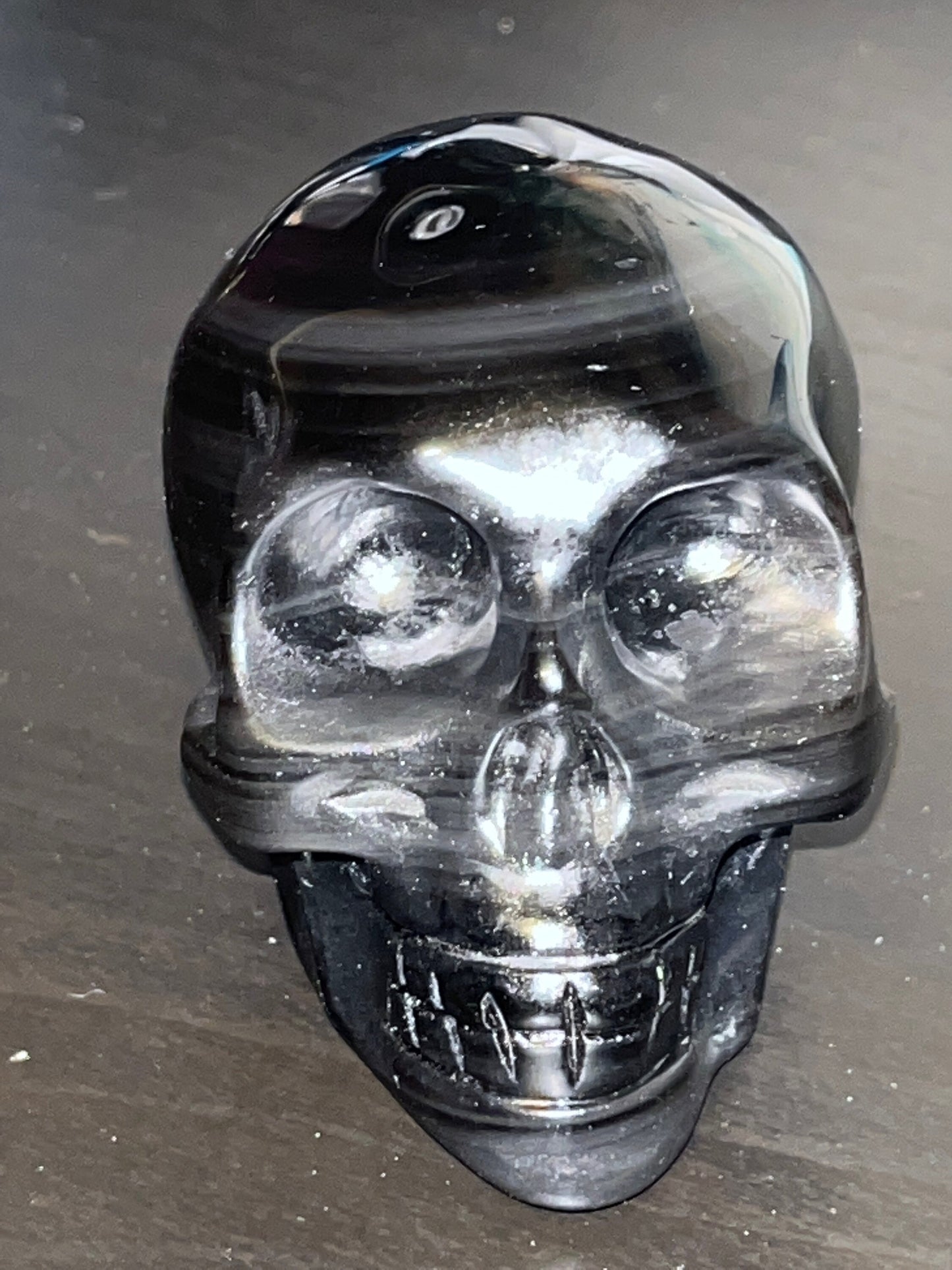 Banded Black Obsidian crystal  skull carving with smiling face and beautiful banding! Good for protection, stability, balance