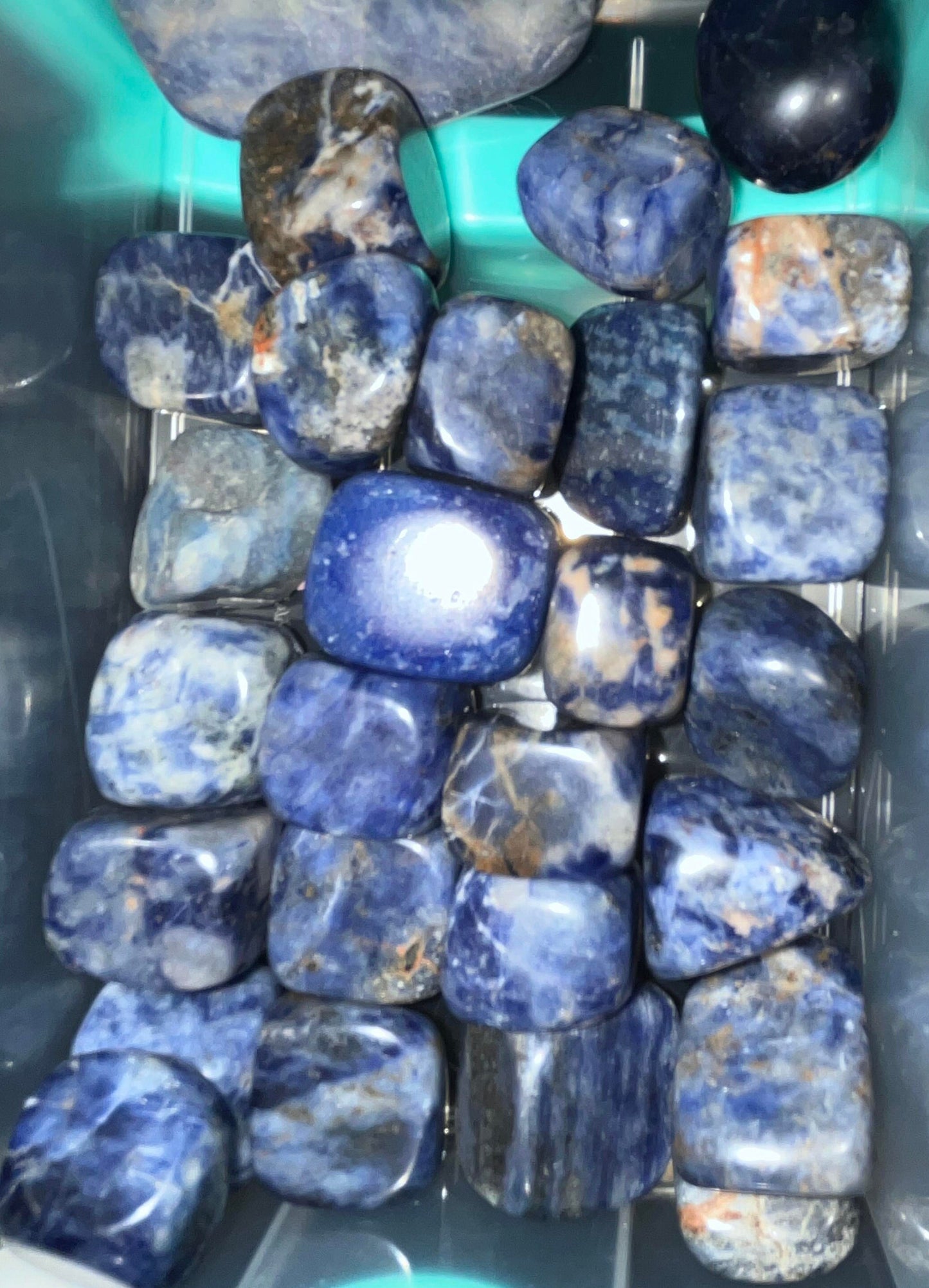 Sodalite crystal tumbles- emotional balance, calms panic attacks, self-esteem, self-acceptance, self-trust, rational thought, perception