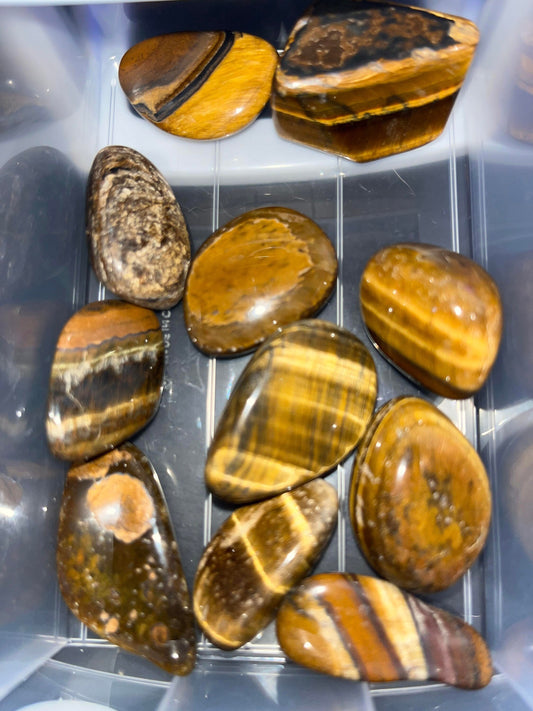 Tiger's Eye crystal tumbles- Protection, confidence, strength, grounding, courage, mental clarity.